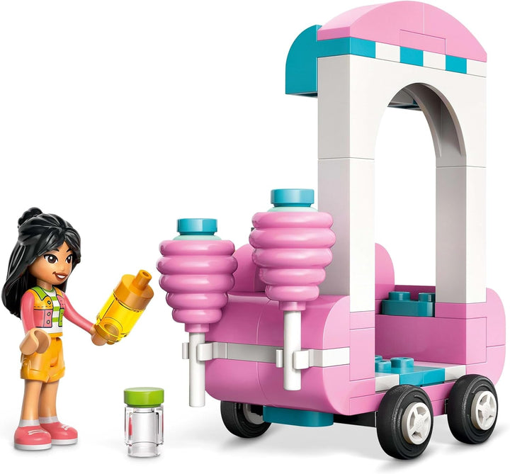 Suport pentru vată de zahăr LEGO Friends, set de joacă pentru jocuri de rol creative cu 2 minifigurine, suport mobil și accesorii, cadou pentru fete de la 6 ani, set de construcție cu mini păpuși 42643